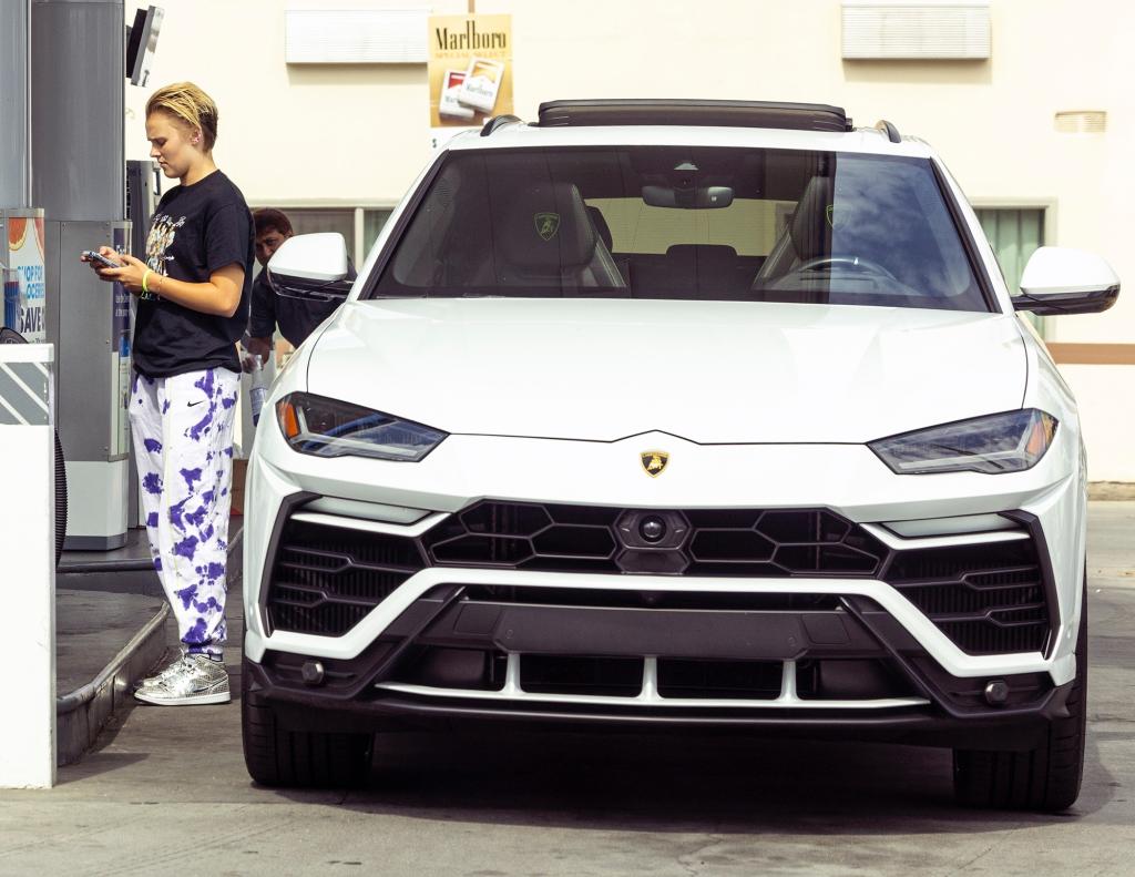 *EXCLUSIVE* Jojo Siwa fuels up his new car and welcomes fans to Tarzana