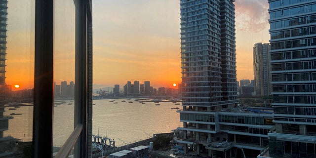 FILE - Apartments under construction are pictured from a building at sunset in the Shekou area of ​​Shenzhen, Guangdong province, China November 7, 2021.