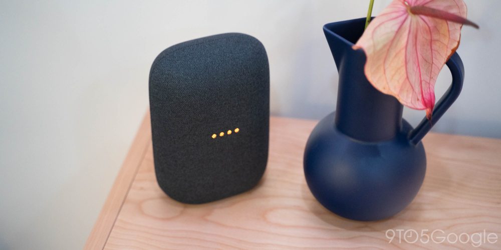 Nest Audio speaker next to a decorative vase