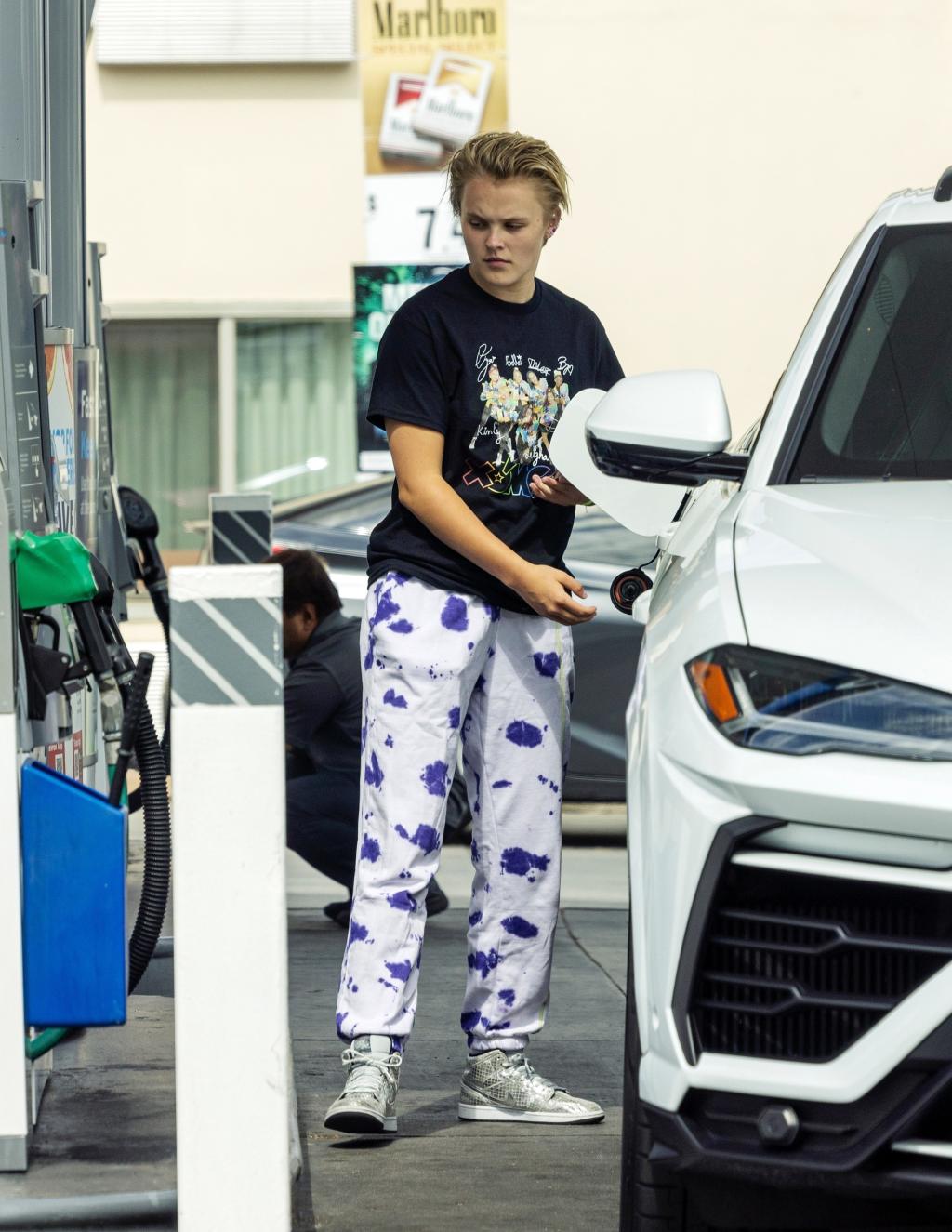 *EXCLUSIVE* Jojo Siwa fuels up his new car and welcomes fans to Tarzana