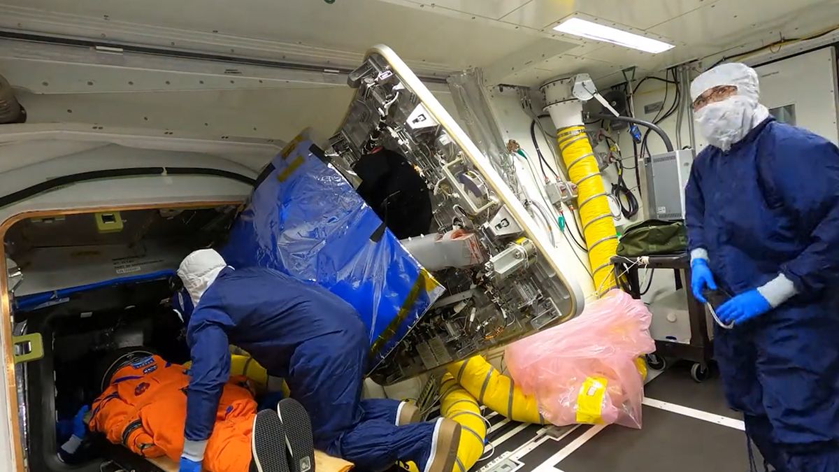 NASA technicians load the 