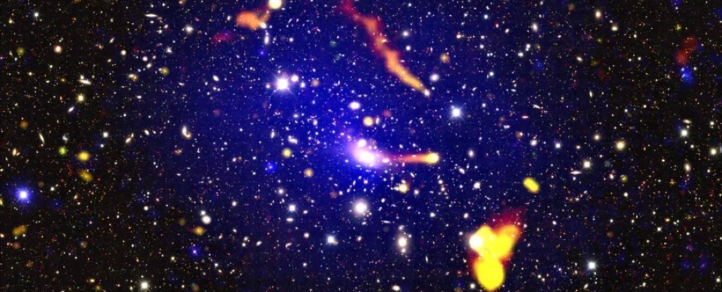 Strange radio sources in a distant galaxy cluster defy our understanding

